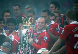Rooney com titulo da Premier League 2010-11